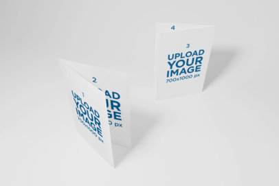 Mockup of Two Bi-Fold Brochures Standing in a Plain Background