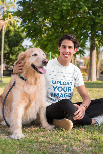 T-Shirt Mockup of a Man Sitting Next to His Dog at a Park