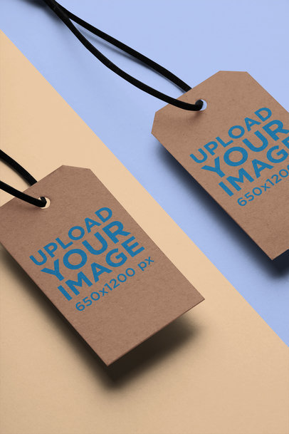 Mockup of Two Brand Tags Over a Two-Colored Surface 27635