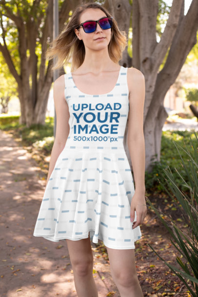 Skater Dress Mockup of a Woman Walking at a Park 