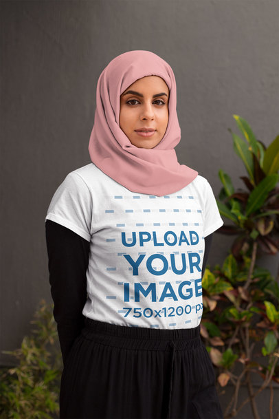 T-Shirt Mockup of a Serious-Looking Woman Wearing a Hijab