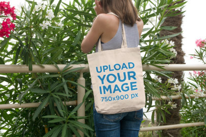 Tote Bag Mockup of a Woman Enjoying Nature