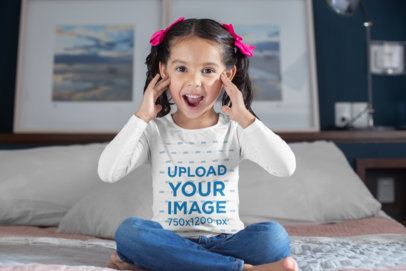 Long Sleeve T-Shirt Mockup of a Kid with a Surprised Face 