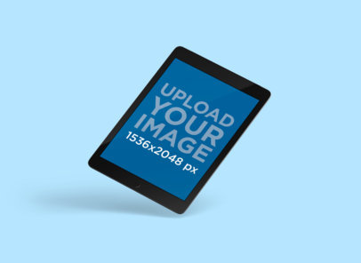 Minimal Mockup Featuring an iPad Floating Over a Solid Color Backdrop