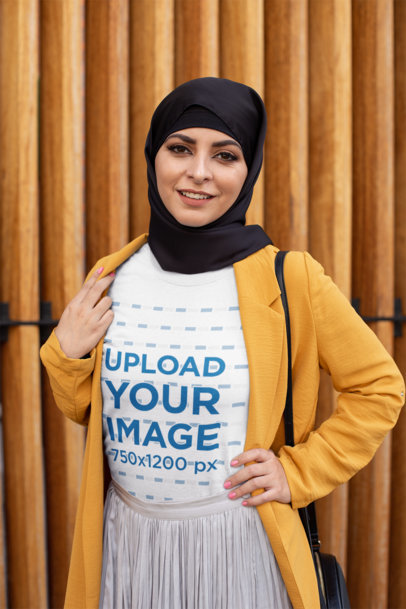 T-Shirt Mockup of a Trendy Woman with a Hijab 