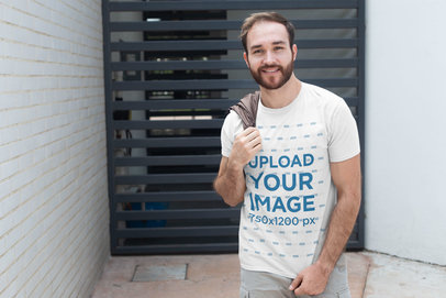 T-Shirt Mockup of a Bearded Man Posing in Style