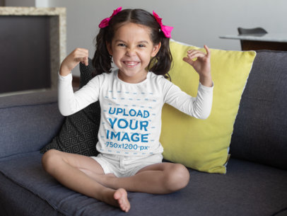 Long Sleeve T-Shirt Mockup of a Little Girl Making a Funny Face