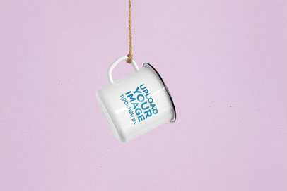 Mockup Featuring a 12 oz Enamel Mug Hanging From a Rope