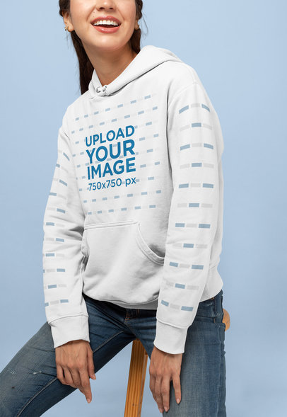 Pullover Hoodie Mockup of a Happy Young Woman at a Studio