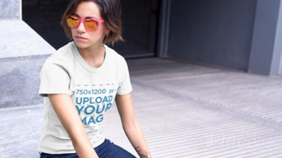 T-Shirt Video of a Cool Young Woman Chilling Next to a Parking Entrance 12151