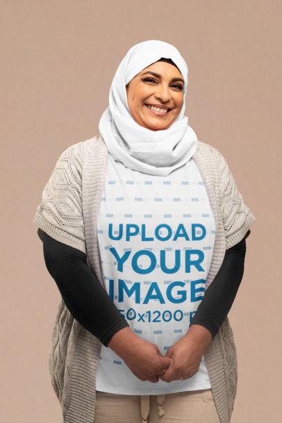Shirt Mockup of a Smiling Woman Wearing a Hijab 