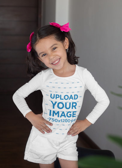 Long Sleeve Tee Mockup Featuring a Little Girl Posing at Her House