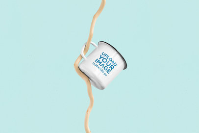  Mockup Featuring a 12 oz Enamel Mug Hanging From a Dry Branch 183-el