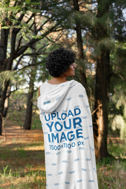 Hooded Fleece Blanket Mockup Featuring a Short-Haired Woman in the Woods 28133