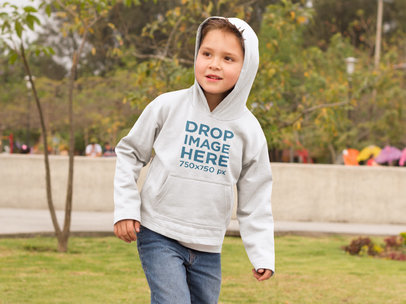 Young Kid at a Park Running Around Hoodie Mockup
