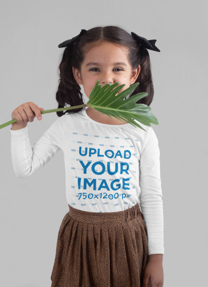 Long Sleeve T-Shirt Mockup of a Girl Covering Her Face with a Plant 