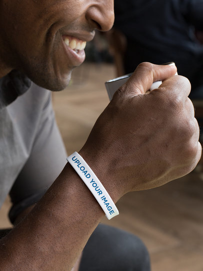 Silicone Wristband Mockup of a Man Drinking His Coffee 28229