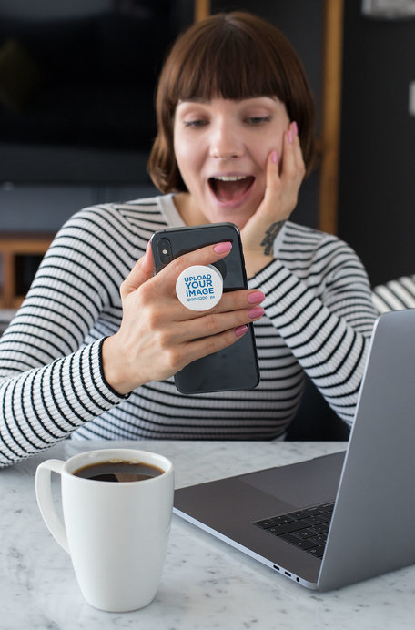 Phone Grip Mockup of a Surprised Woman Looking at Her Phone