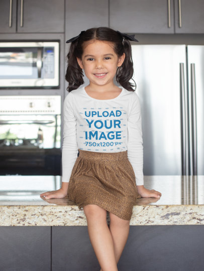 Long Sleeve T-Shirt Mockup of a Girl Sitting on a Tabletop