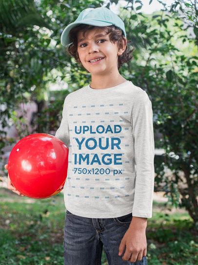 Heathered Long Sleeve Tee Mockup of a Kid Playing Outside