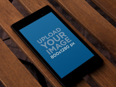 Nexus 7 Mockup Featuring a Wooden Surface