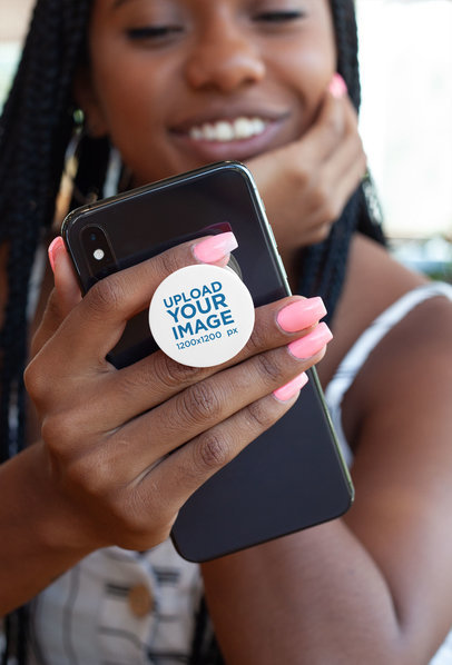 Phone Grip Mockup of a Woman Smiling While Looking at Her Phone 