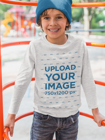 Long Sleeve Tee Mockup Featuring a Happy Kid Playing Outside