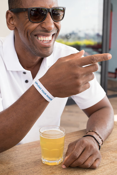 Paper Wristband Mockup Featuring a Man with Sunglasses  