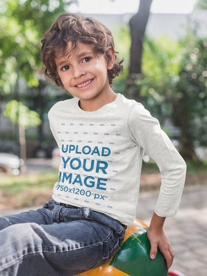 Long Sleeve T-Shirt Mockup Featuring a Smiling Kid at an Urban Playground 28123