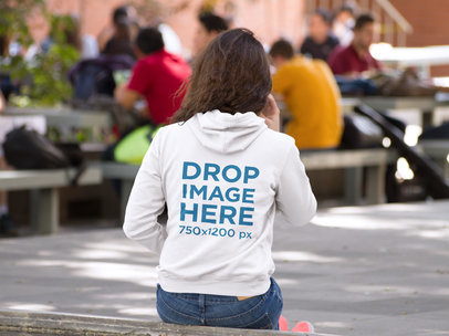 Back Mockup of a Girl Wearing a Hoodie while Making a Call a9184b