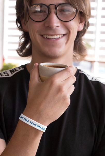 Silicone Wristband Mockup of a Man with Glasses 