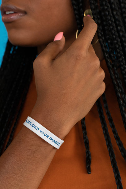 Mockup Featuring a Long-Haired Woman Wearing a Silicone Wristband 28232