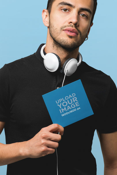 Digipak Mockup Featuring a Man in a Studio