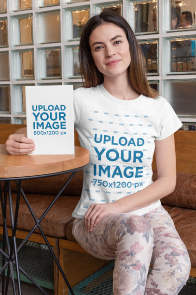 T-Shirt Mockup of a Woman Promoting a Book 