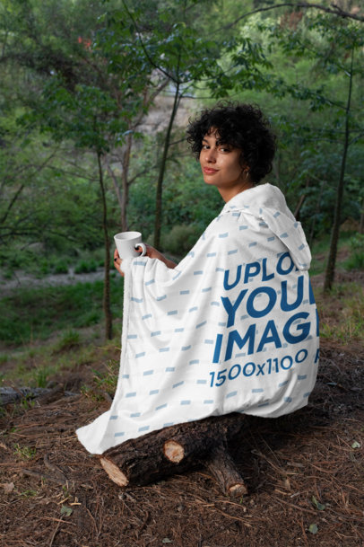 Hooded Fleece Blanket Mockup of a Woman Sitting in the Woods 28145