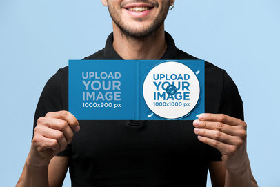Digipak Mockup Featuring a Man Smiling at a Studio 
