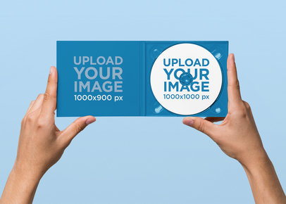 Minimal Digipak Mockup Featuring a Solid Color Backdrop 28333