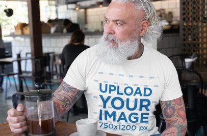 T-Shirt Mockup of a Senior Man Drinking a Coffee