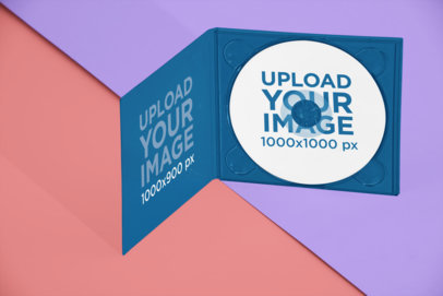 Mockup of a Digipak Placed Over Two Colored Papers 