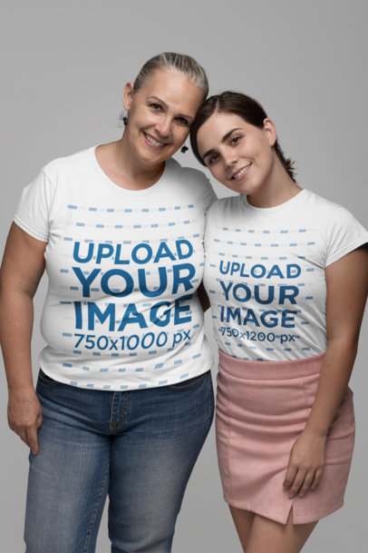 Mockup of Two Women Wearing a T-Shirt at a Studio