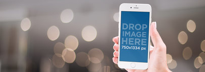 Mockup of an iPhone Being Used at Night in the City