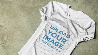 Video of a Sports Jersey Placed on Concrete Floor