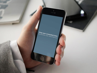 Mockup of an Office Worker Holding an iPhone 5