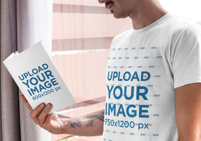 T-Shirt Mockup of a Man Reading a Book at His House
