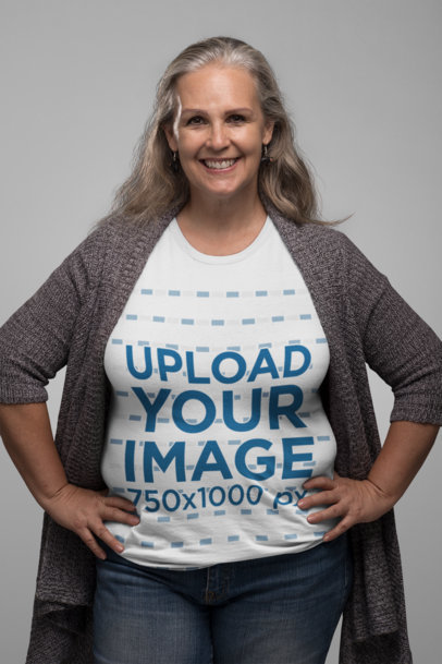 T-Shirt Mockup of a Smiling Senior Lady with Hands on Her Waist