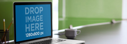 Mockup of a Macbook Pro on a Desk at a Home Office