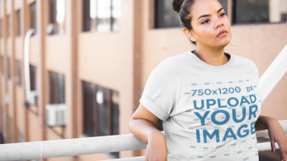 Plus Size T-Shirt Video Featuring a Young Woman on a Pedestrian Bridge 12523