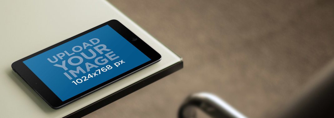 Black iPad Mini Lying on a Crystal Table Tablet Mockup