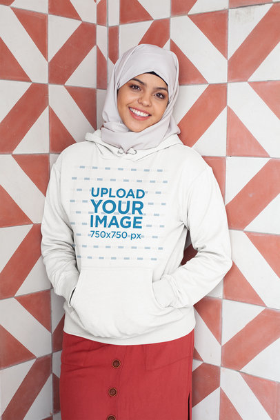 Mockup of a Woman with a Hijab Wearing a Hoodie Pullover 