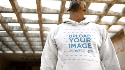 Hoodie Video of a Man with a Big Attitude at an Abandoned Building